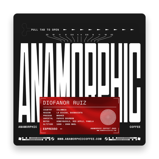 Anamorphic coffee packaging with brand name and product details on a black background