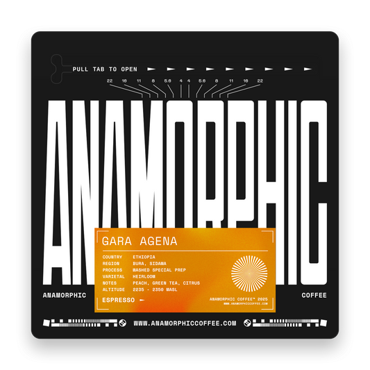 Anamorphic coffee packaging with brand name and product details on a black background